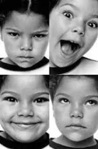 Four faces of girl kid with angry ,surprised, happy and sad face